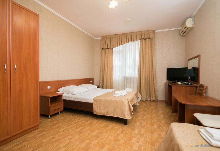 Семейный стандарт трехместный. Отель Экодом Фэмили, Сочи