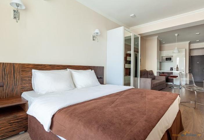 Апартаменты улучшенные четырехместные с кухней и балконом