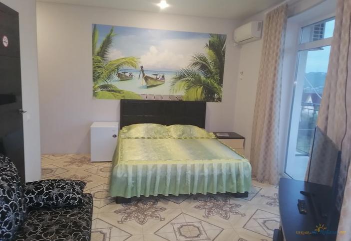 Улучшенный трёхместный с большим балконом