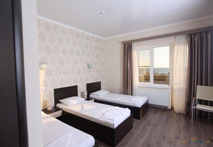 Стандарт плюс трехместный (вид на море) с односпальными кроватями