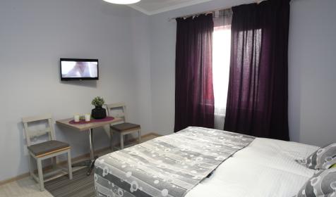 Четырехместный двухкомнатный улучшенный номер с кухней