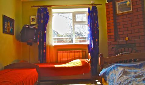 Семейный четырехместный с видом на сад