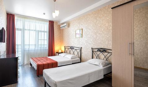 Трехместный с видом на море и балконом