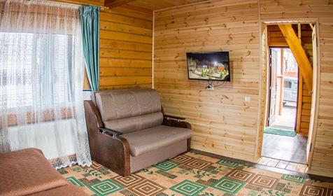 Деревянный двухэтажный коттедж-сруб