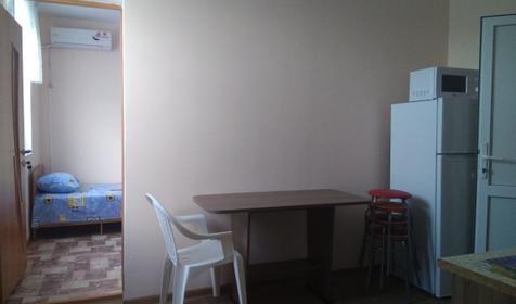 Двухкомнатный номер с кухней и стиральной машиной на 5 мест