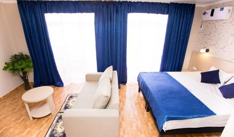 Четырехместный джуниор сьют с балконом и видом на море