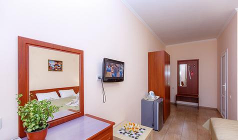 Четырехместный полулюкс с балконом