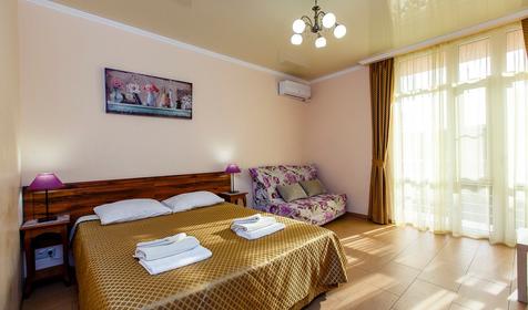 Четырехместный полулюкс с балконом