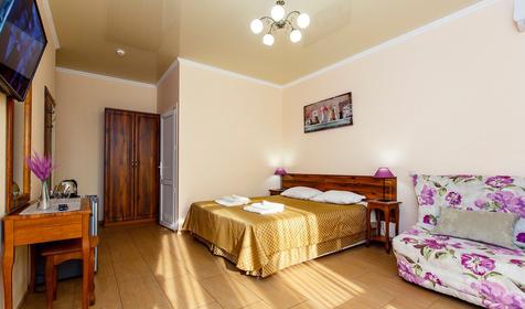 Четырехместный полулюкс с балконом