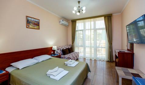 Четырехместный полулюкс с балконом