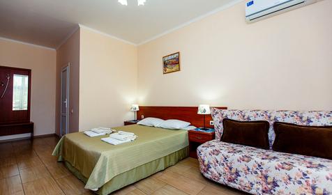 Четырехместный полулюкс с балконом