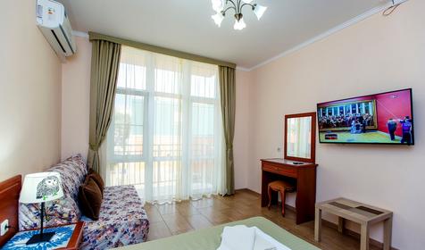 Четырехместный полулюкс с балконом