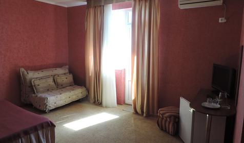 Четырехместный номер стандарт с видом на море и балконом