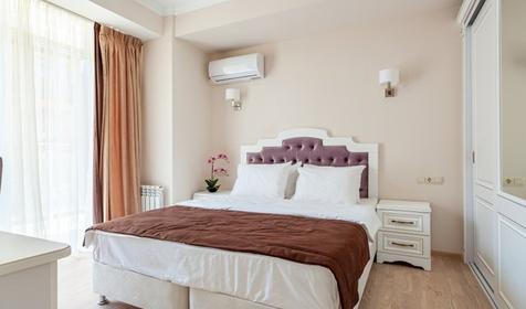 Апартаменты делюкс двухкомнатный с кухней и балконом