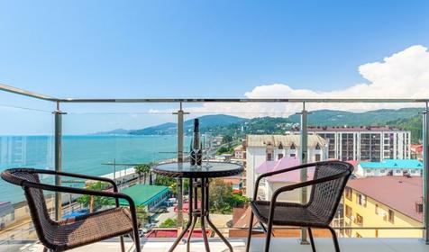 Апартаменты делюкс двухкомнатный с кухней и балконом