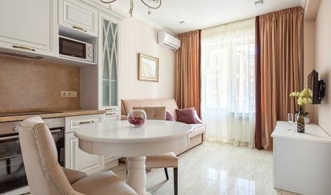 Апартаменты делюкс двухкомнатный с кухней и балконом