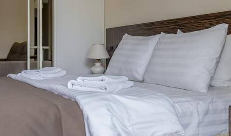 Апартаменты улучшенные четырехместные с кухней и балконом