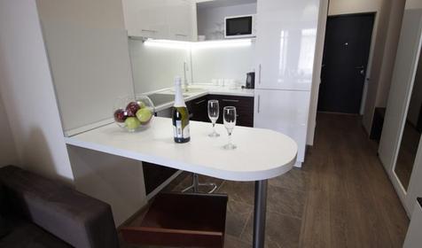 Апартаменты улучшенные четырехместные с кухней и балконом