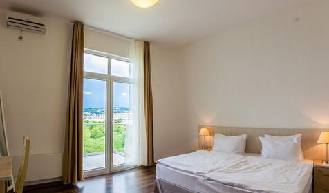 Апартаменты четырехместный с 2 спальнями и кухней (выход на кровлю)