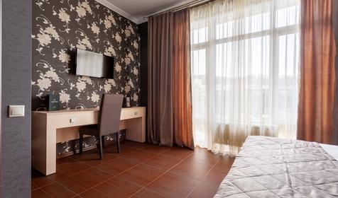 Люкс двухкомнатный двухместныйс видом на бассейн