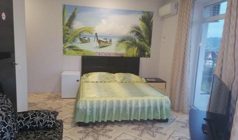 Улучшенный трёхместный с большим балконом