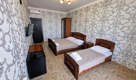 Делюкс трехместный с балконом и видом на море