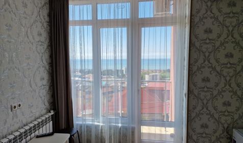 Делюкс четырехместный с балконом и видом на море