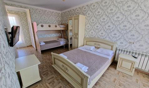 Делюкс четырехместный с балконом и видом на море