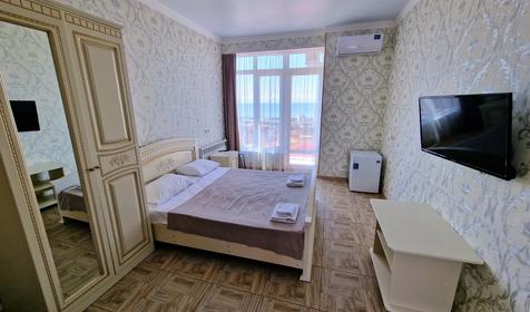 Делюкс четырехместный с балконом и видом на море