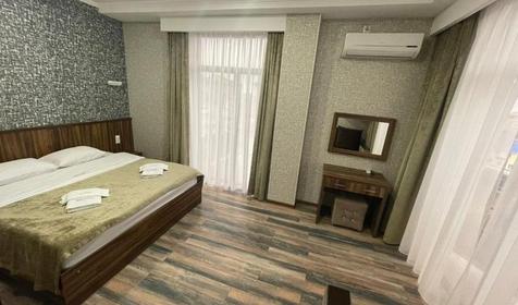 Апартаменты Делюкс 3-местный 2-комнатный (с балконом)