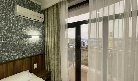 Апартаменты Делюкс 3-местный 2-комнатный (с балконом)