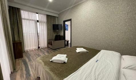 Апартаменты Делюкс 3-местный 2-комнатный (с балконом)