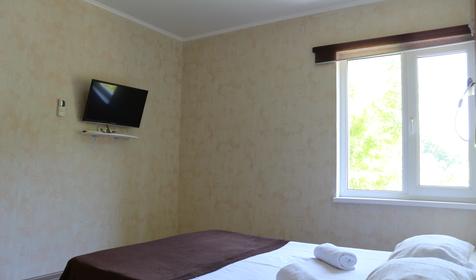 Четырехместный двухкомнатный номер с балконом