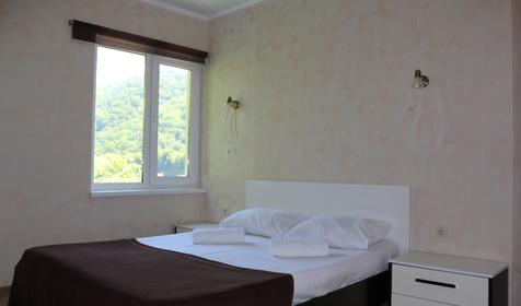 Четырехместный двухкомнатный номер с балконом