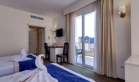 Четырехместный с балконом (вид на море)