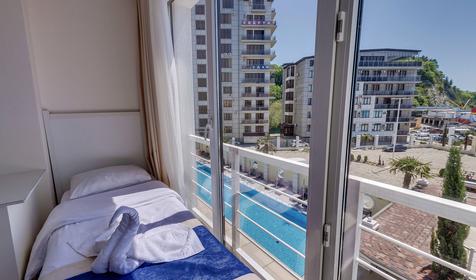 Четырехместный с балконом (вид на море)