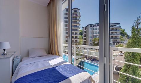 Четырехместный с балконом (вид на море)