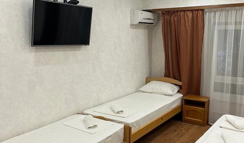 Четырехместный стандарт с 4 односпальными кроватями