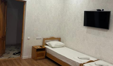 Четырехместный стандарт с 4 односпальными кроватями