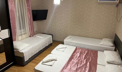 Четырехместный стандарт с 4 односпальными кроватями