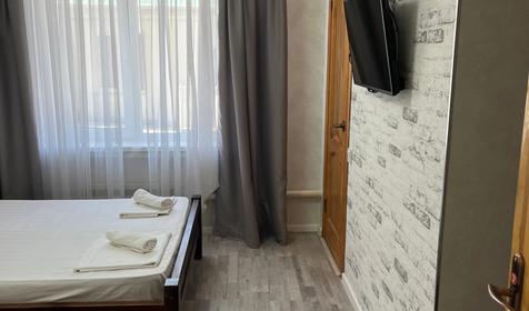 Четырехместный стандарт с 4 односпальными кроватями