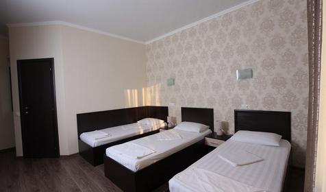 Стандарт плюс трехместный (вид на море) с односпальными кроватями