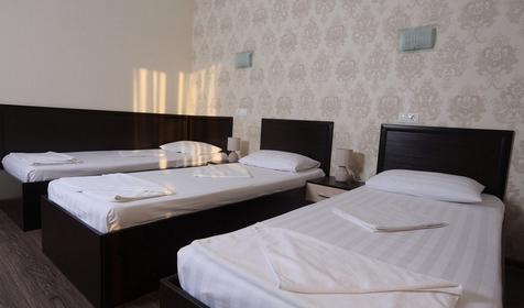 Стандарт плюс трехместный (вид на море) с односпальными кроватями