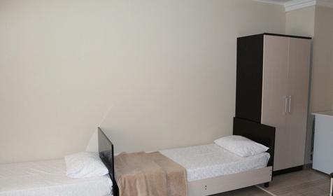 Однокомнатный четырехместный стандарт с балконом на два номера