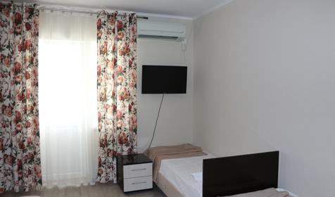 Однокомнатный четырехместный стандарт с балконом на два номера