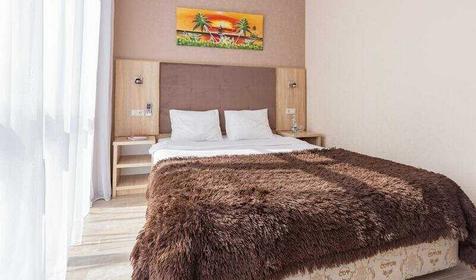 Двухкомнатный люкс, вместимость до 7 человек